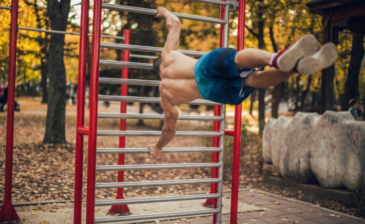 Human flag position on a vertical bar